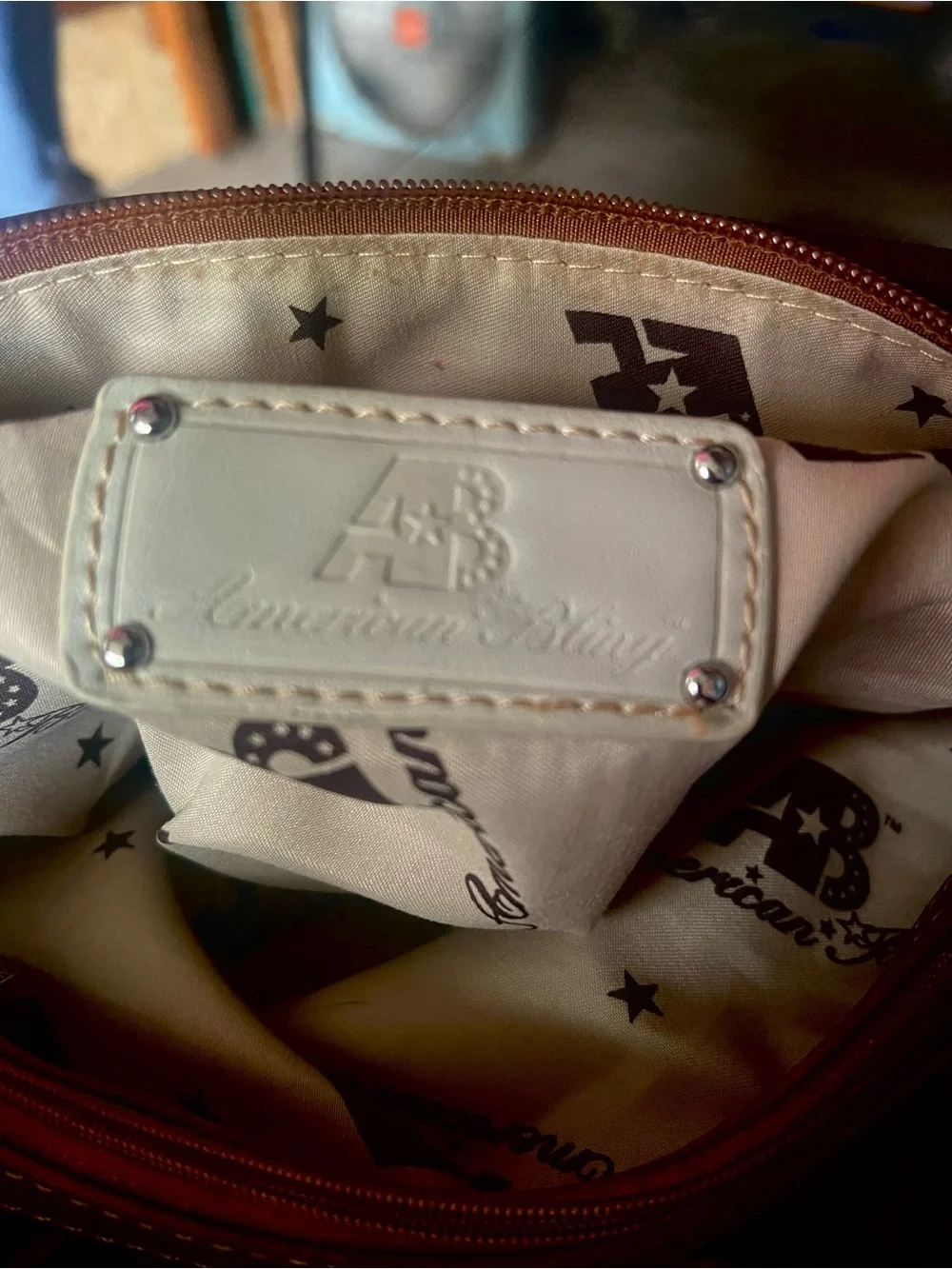 American Bling western style embossed design , end pockets  satchel handbag